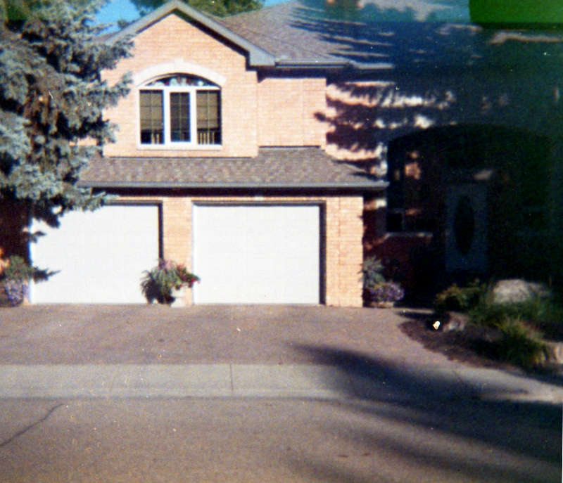 Stucco-covered house photographed with Ansco 50 minicamera and Fuji 110 film