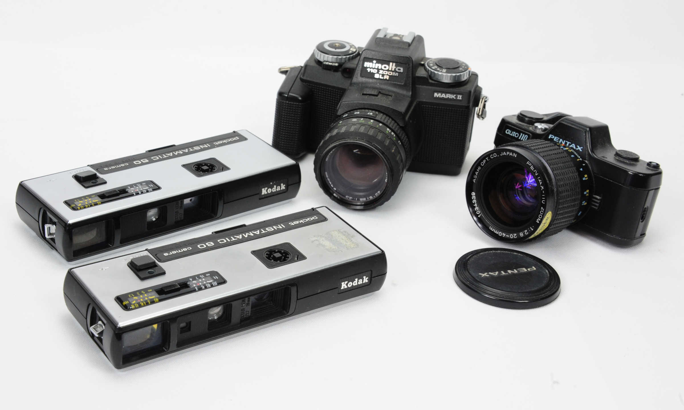 three high-end 110 cameras